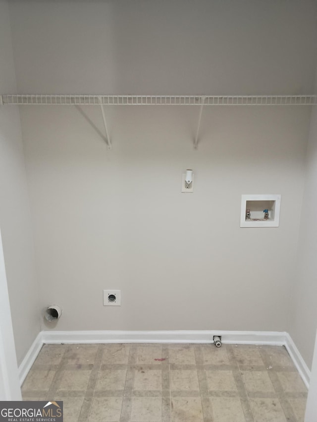 washroom with hookup for a washing machine, hookup for an electric dryer, gas dryer hookup, and baseboards