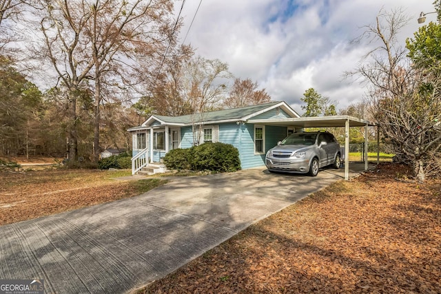 view of front of house with a carport