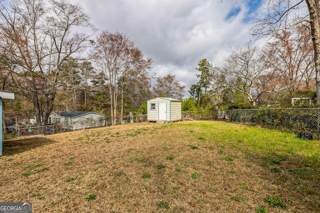 view of yard with a storage shed