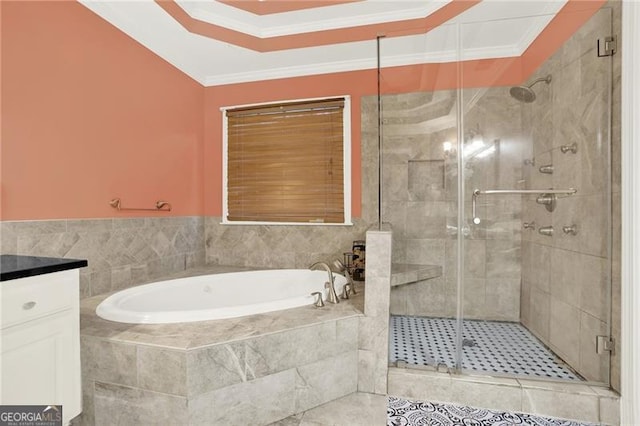 bathroom featuring a stall shower, a garden tub, and crown molding