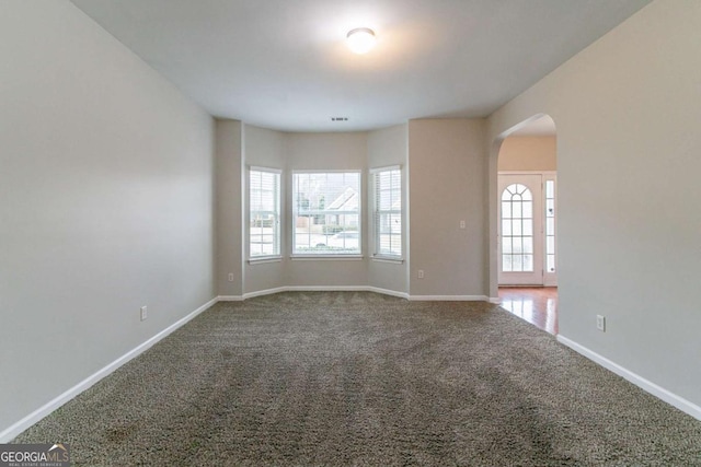 view of carpeted spare room