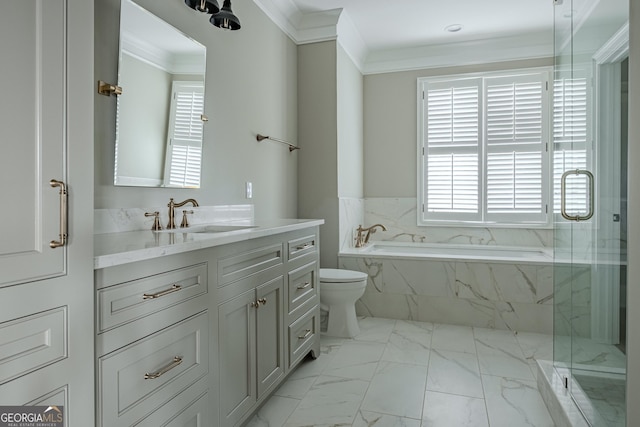 full bathroom featuring ornamental molding, separate shower and tub, vanity, and toilet