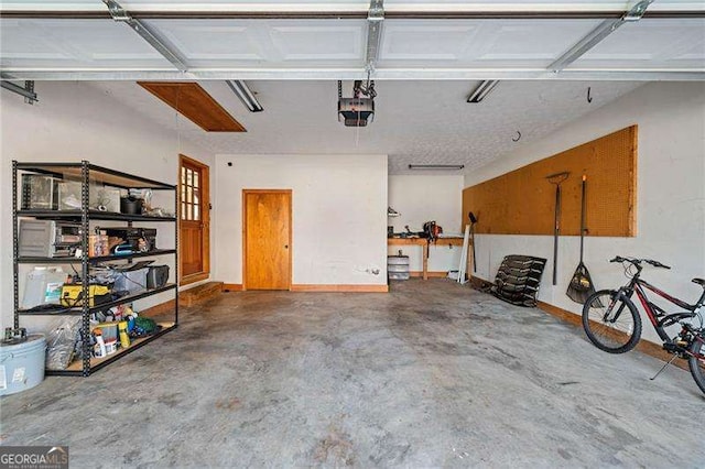 garage featuring a garage door opener