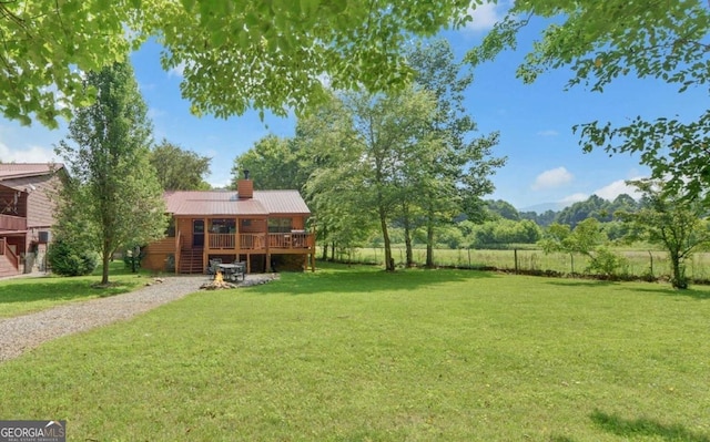 view of yard with a deck