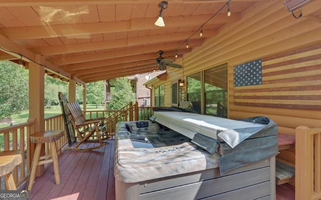 wooden terrace with a ceiling fan