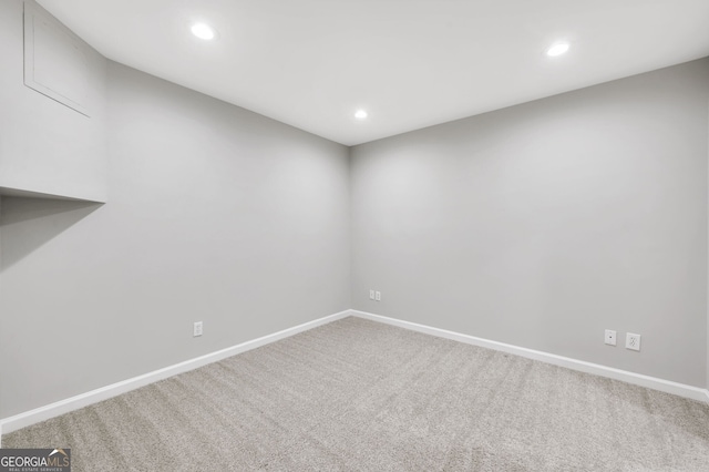 spare room featuring carpet flooring