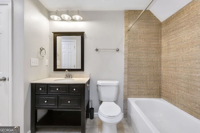 full bathroom featuring tiled shower / bath combo, vanity, and toilet