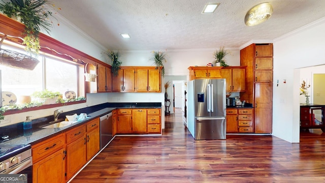 kitchen with crown molding, stainless steel appliances, dark hardwood / wood-style flooring, and sink