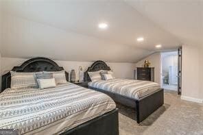 bedroom featuring lofted ceiling