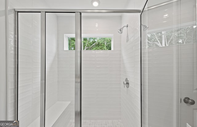 bathroom with an enclosed shower