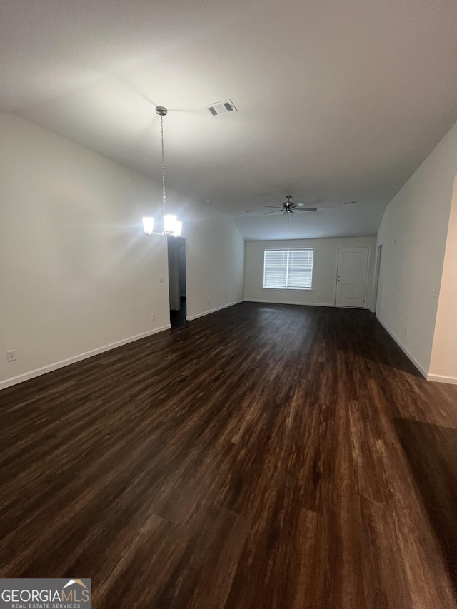 unfurnished living room with dark wood-type flooring and ceiling fan