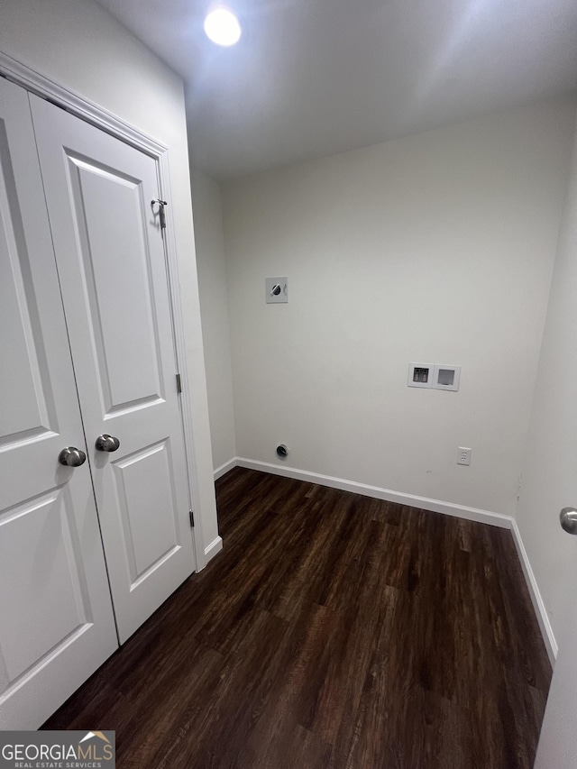 washroom featuring hookup for a washing machine, electric dryer hookup, and dark wood-type flooring