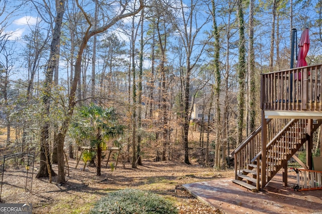 view of yard with a wooden deck