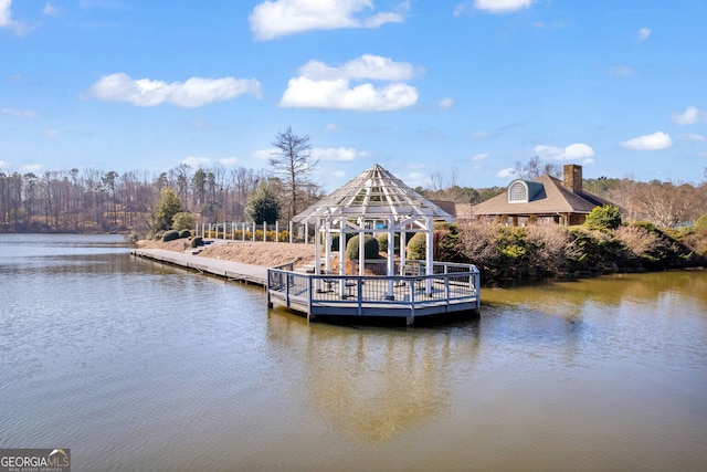 dock area featuring a gazebo and a water view