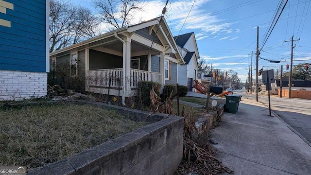 view of home's exterior featuring covered porch