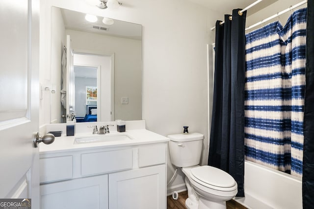 full bathroom with vanity, toilet, and shower / bathtub combination with curtain