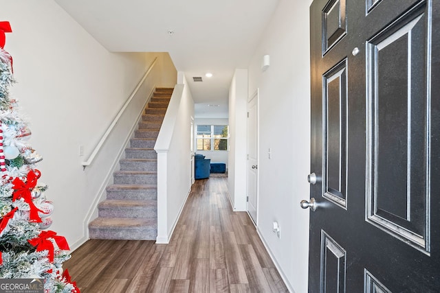 foyer featuring hardwood / wood-style flooring