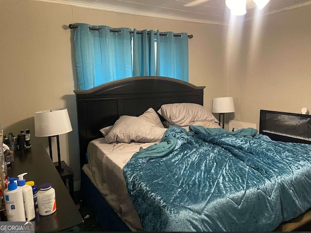 bedroom with crown molding