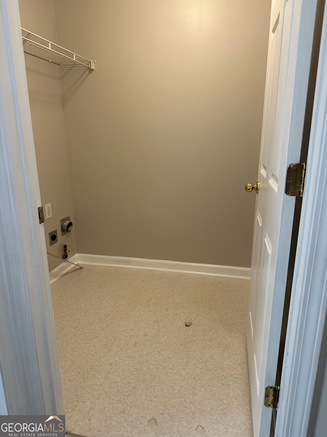 walk in closet with carpet floors