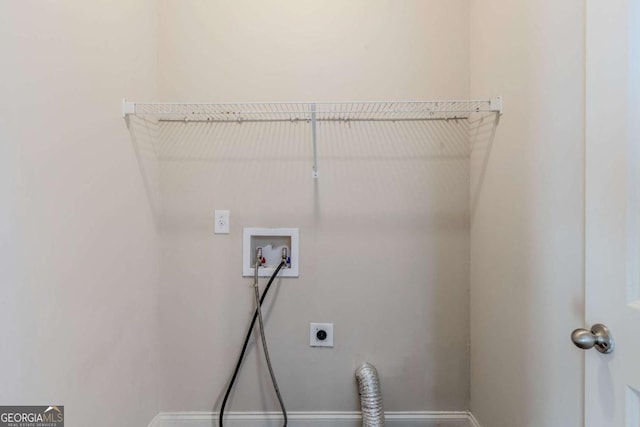 laundry area featuring hookup for an electric dryer and hookup for a washing machine