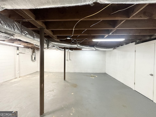 basement with electric panel