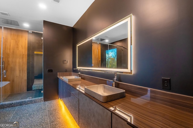 bathroom featuring vanity and walk in shower