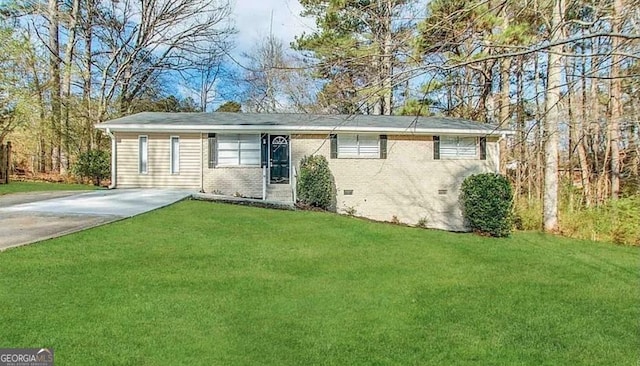 ranch-style home with a front yard