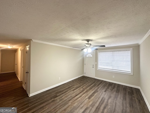 unfurnished room with crown molding, dark wood-type flooring, a textured ceiling, and ceiling fan