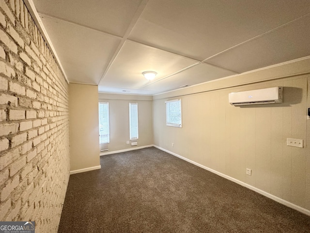 4954 Springbrook Dr, Douglasville, GA 30135 - unfurnished room with a wall unit AC and dark colored carpet