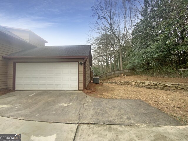 garage with central AC unit