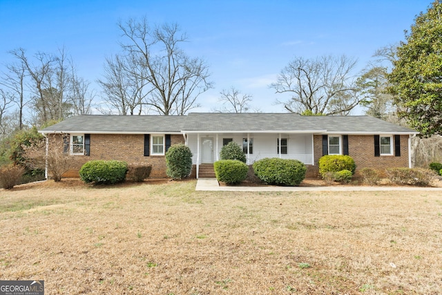 ranch-style home with a front yard