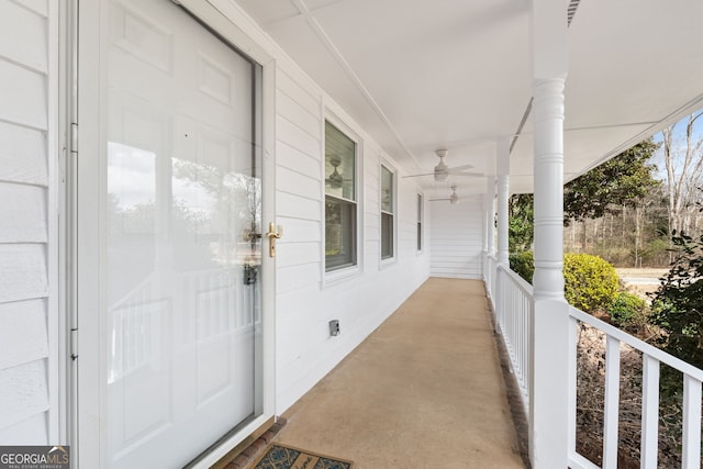 exterior space featuring ceiling fan