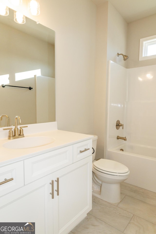 full bathroom featuring toilet, shower / tub combination, and vanity