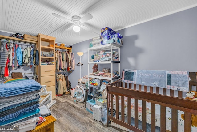 bedroom featuring ceiling fan and hardwood / wood-style floors