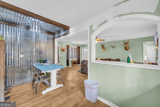 game room featuring ceiling fan and light wood-type flooring