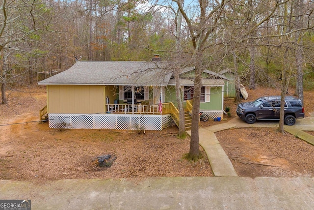 ranch-style home with covered porch