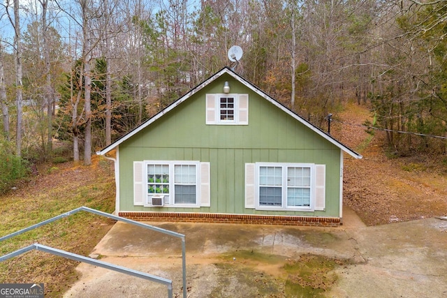 view of home's exterior featuring cooling unit