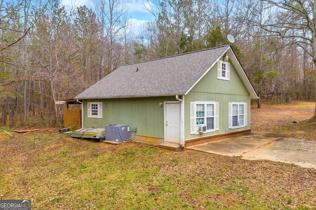 rear view of property featuring a patio