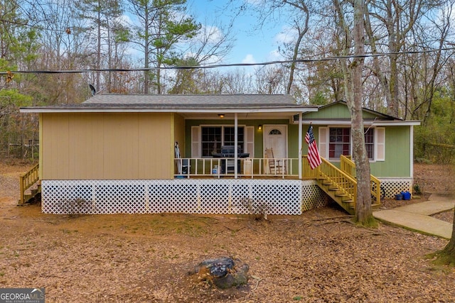 ranch-style house featuring a porch