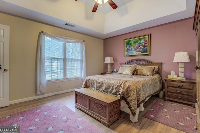 bedroom with ceiling fan and light wood-type flooring