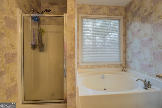 bathroom featuring plus walk in shower