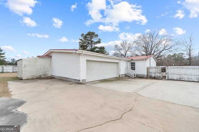 exterior space with a garage