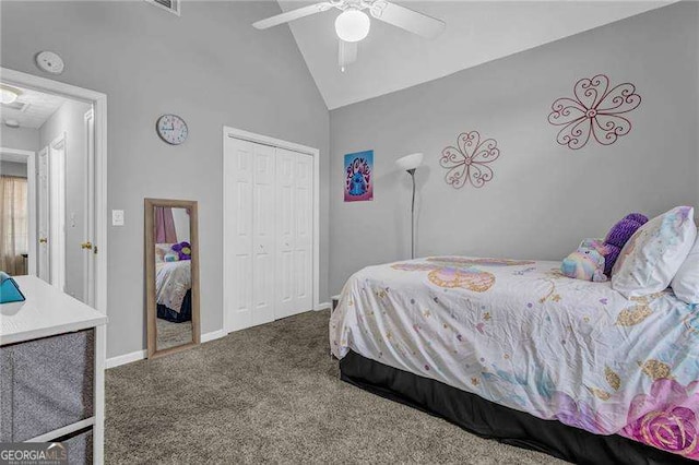 carpeted bedroom featuring lofted ceiling, a closet, and ceiling fan