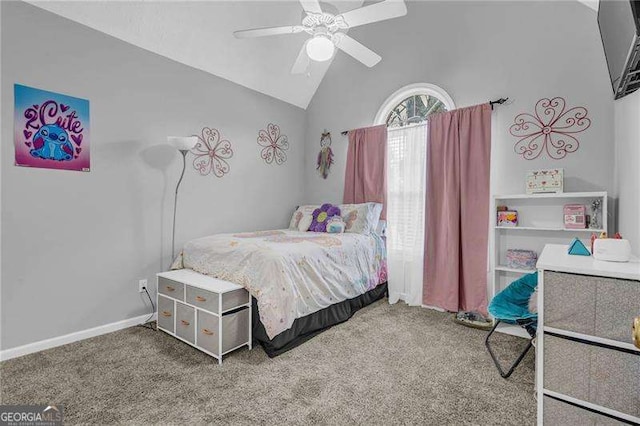 bedroom with ceiling fan, carpet flooring, and vaulted ceiling