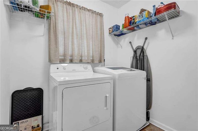 laundry area featuring separate washer and dryer