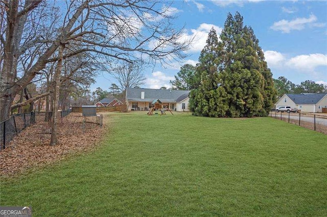 view of yard with a playground