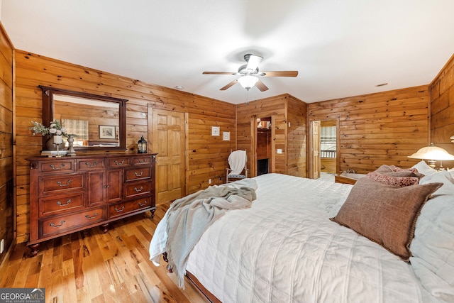 bedroom featuring ceiling fan and light hardwood / wood-style floors