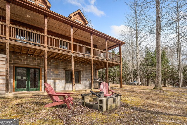 back of house featuring french doors