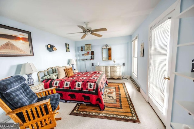 bedroom featuring baseboard heating and ceiling fan