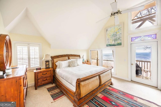 carpeted bedroom with lofted ceiling, access to exterior, and ceiling fan